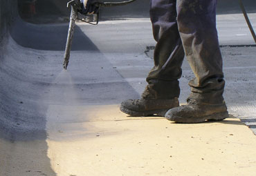 Coating systems over Augusta spray foam roof systems